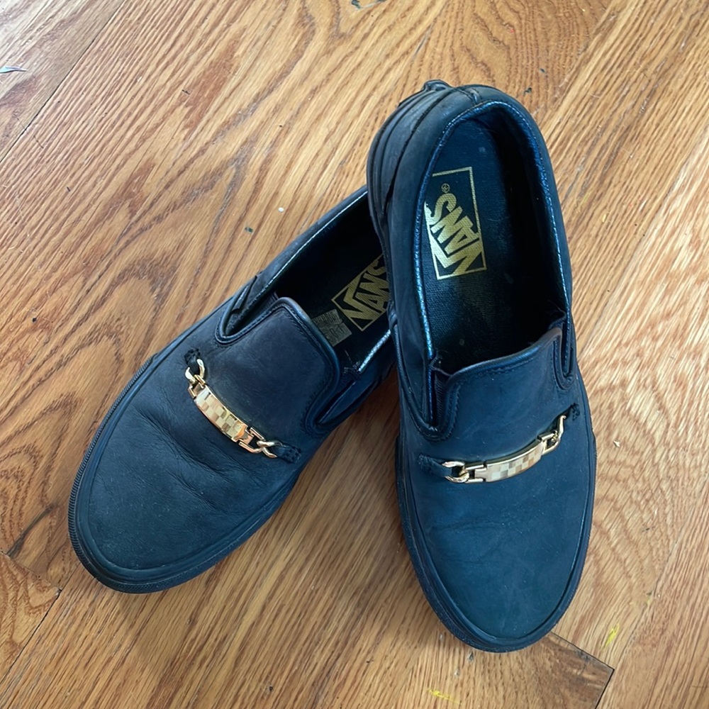 Vans black & gold slip ins with gold bar size 7 women’s